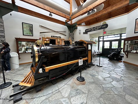 train, picnic tables, display, inside