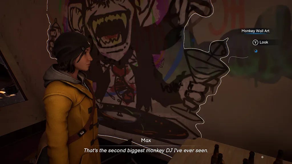 Max looking at a graffiti of a DJ monkey saying “That’s the second biggest monkey DJ I’ve ever seen.”