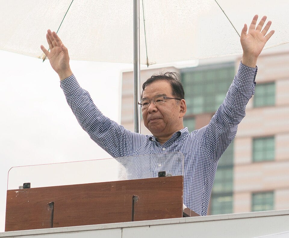 File:Kazuo Shii, Chairman of the Japanese Communist Party, making a street speech at Hakata Station 2022-06-24 (cropped).jpg
