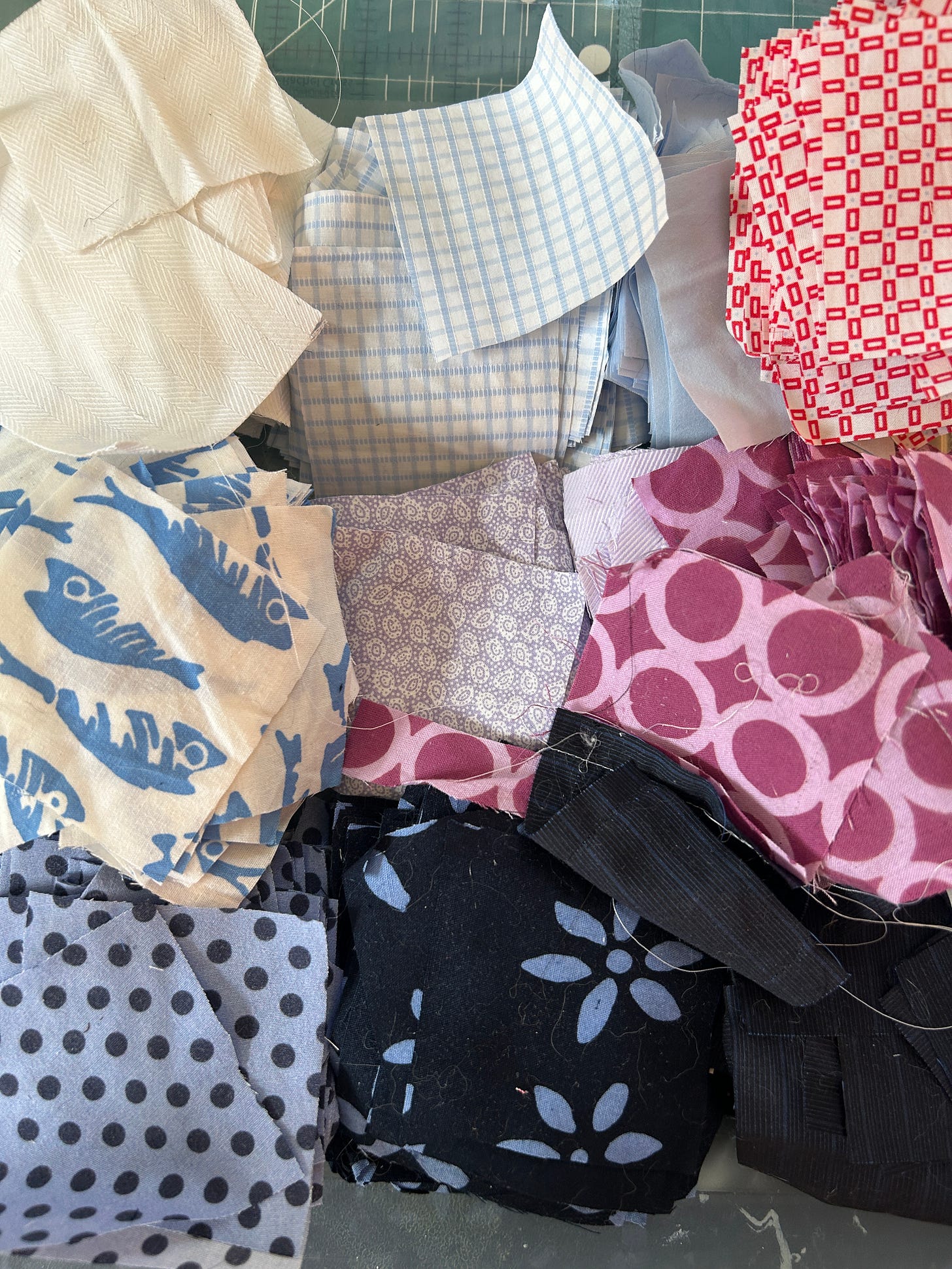 Piles of colorful fabric squares