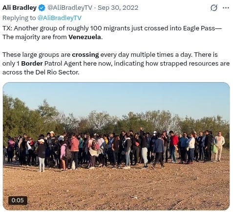 Scene from NewsNation coverage of a migrant rush at the Texas border.