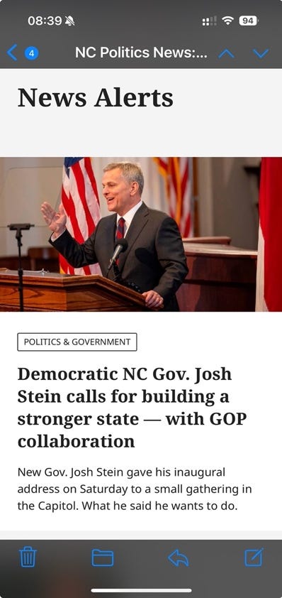 A person standing at a podium with a flag

Description automatically generated