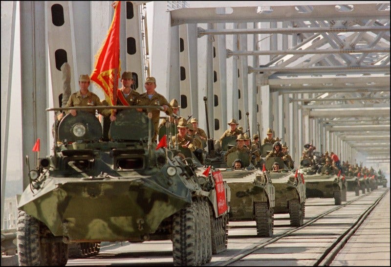 A convoy crosses a bridge in Termez, now part of Uzbekistan, during the withdrawal of the Soviet Red Army from Afghanistan, on May 21, 1988. A convoy crosses a bridge in Termez, now part of Uzbekistan, during the withdrawal of the Soviet Red Army from Afghanistan, on May 21, 1988.