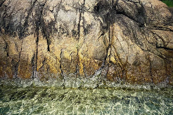A picture containing grass, outdoor, rock, stone

Description automatically generated