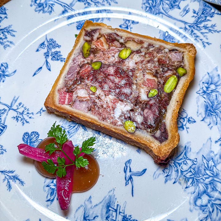Starters at Le Bon Georges in Paris - oeufs mayo, pate en croute, seafood vol-au-vent, and Corsican charcuterie