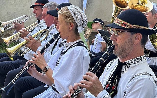 Musicians in a traditional German brass band entertain guests at the 13th annual Haferland Festival in Buneşti, a Saxon village in the Transylvania region of Romania. (Photo by Larry Luxner) Musicians in a traditional German brass band entertain guests at the 13th annual Haferland Festival in Buneşti, a Saxon village in the Transylvania region of Romania. (Photo by Larry Luxner)