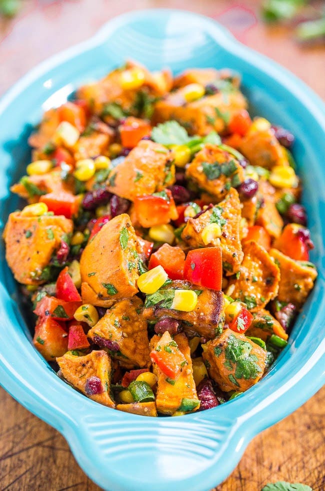 Roasted Sweet Potato Salad — This roasted sweet potato salad is tossed in a honey Dijon dressing. The sweet and savory flavors of this potato salad are to die for! 