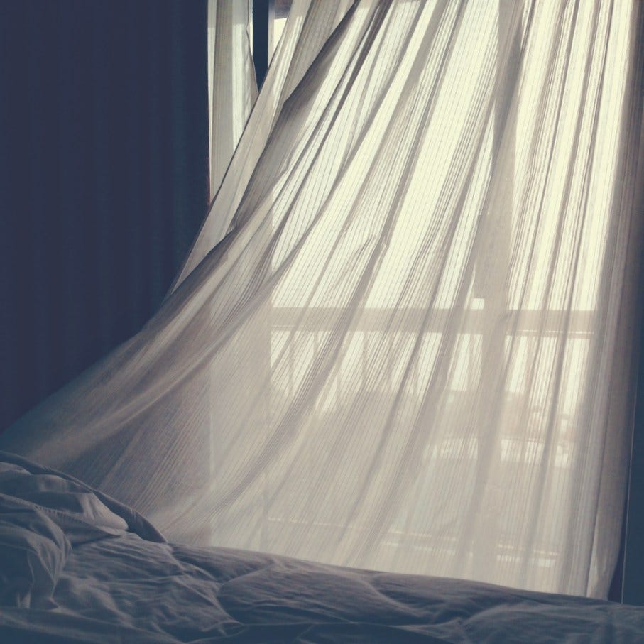 Easy Like Sunday Morning Shannon Jackson, photograph of light coming into a bedroom through sheer curtains Easy Like Sunday Morning Shannon Jackson, photograph of light coming into a bedroom through sheer curtains