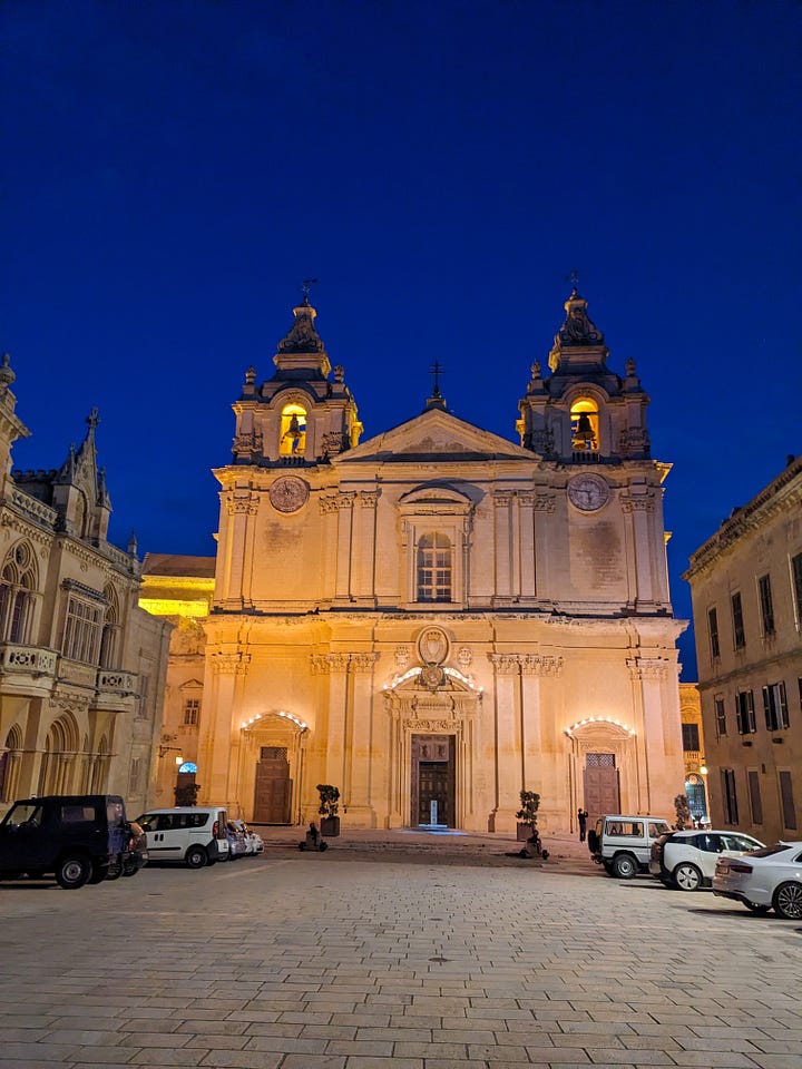 Author in front of a cathedral, and another cathedral by night