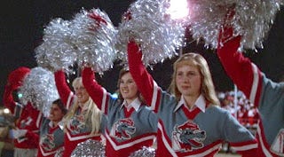 Cheerleaders with pompoms from Ridgemont High