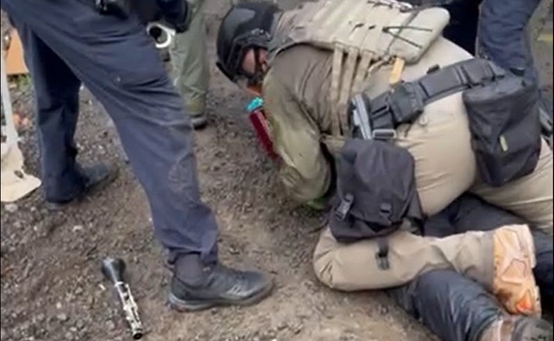 A clarinet player was arrested at the ICE facility in Portland, October 12, 2025 (Kenneth Avery)