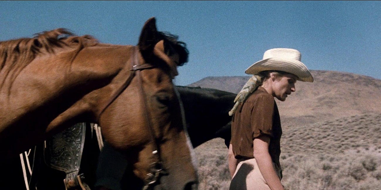 you should wear a cowboy hat to your lesbian wedding