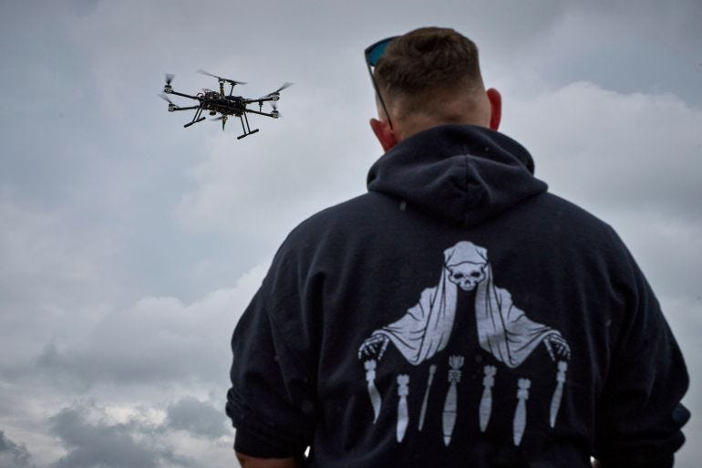 FILE - An engineer watches a Ukrainian-made quadcopter drone at an undisclosed location in Ukraine, June 12, 2025. (AP Photo/Efrem Lukatsky)