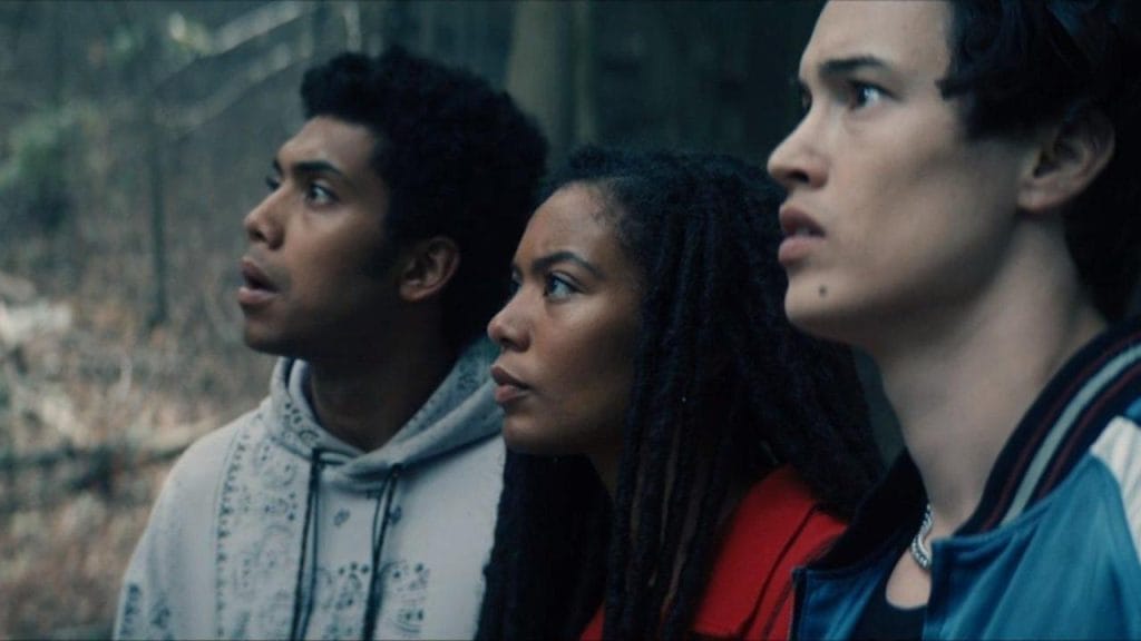 Three of the main characters are looking off camera to the right of the screen. Shocked expressions on their faces. Three of the main characters are looking off camera to the right of the screen. Shocked expressions on their faces.