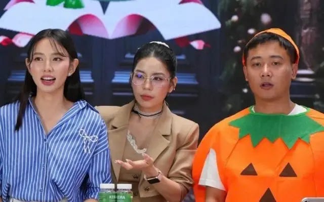 From left: Miss Thuy Tien, Hang Du Mu and Quang Linh Vlog in a livestream session selling Kera vegetable candy before being arrested in April 2025