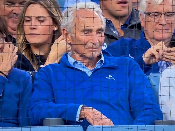 May be an image of one or more people, people playing tennis, crowd and text