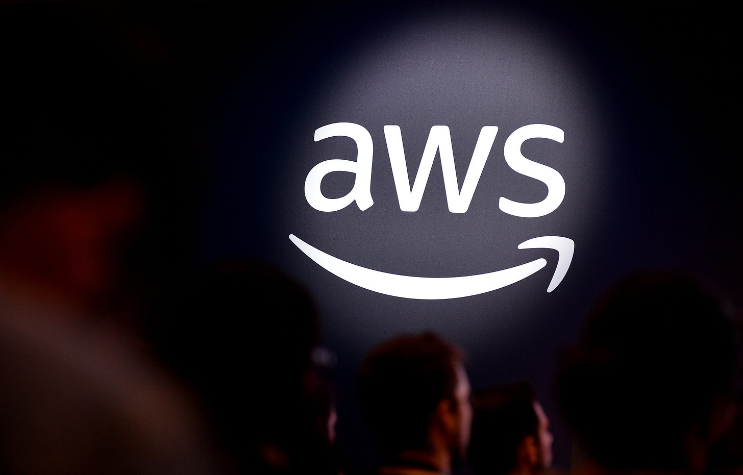 AWS logo in a spotlight AWS logo in a spotlight