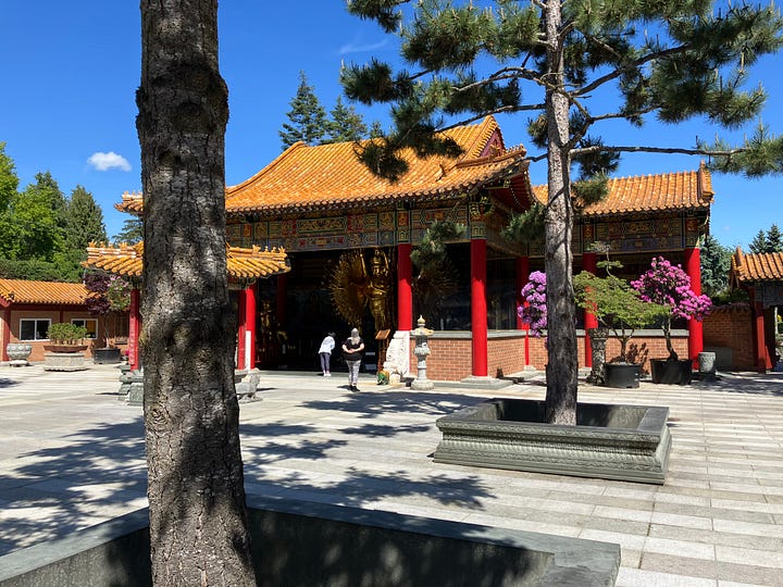Images of a traditional Chinese temple complex built in Richmond, British Columbia, showing various buildings with curved tiled roofs, wide tree-lined squares and golden statues in temple buildings.