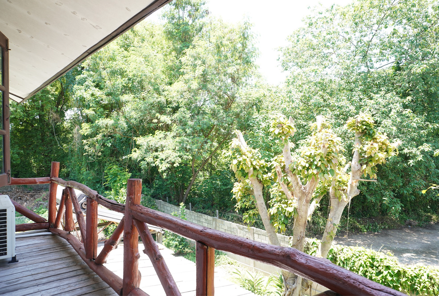 Upstairs balcony (balconies and porches surround most of the house, upstairs and downstairs).