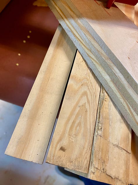 Gluing up the top: Ordering boards, rolling on glue, clamping, a gap opens, trying to close the gap, creating space for a planing stop, more gluing up, popping out the placeholder.