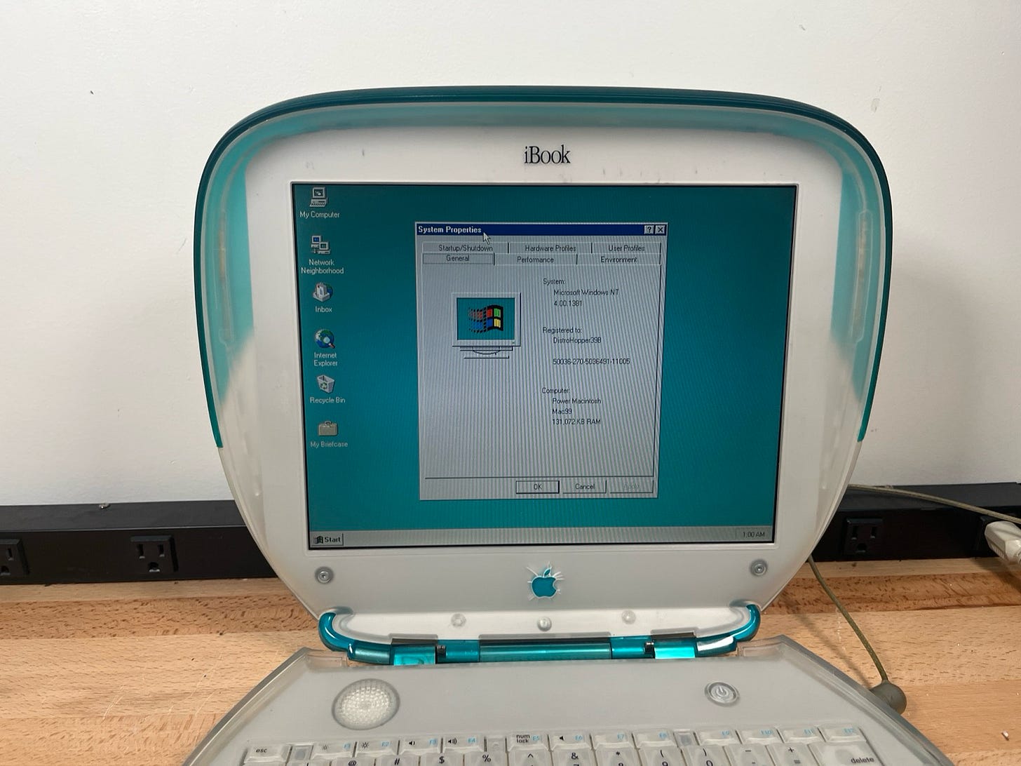 An iBook G3 Clamshell with the about menu for Windows NT 4.0 open. An iBook G3 Clamshell with the about menu for Windows NT 4.0 open.