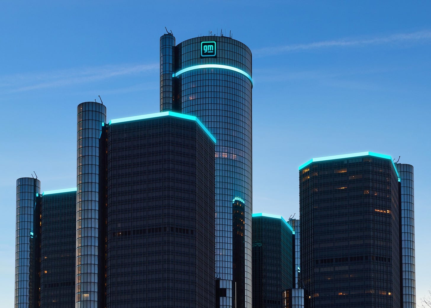 View of General Motors headquarters in Detroit at sunset. View of General Motors headquarters in Detroit at sunset.