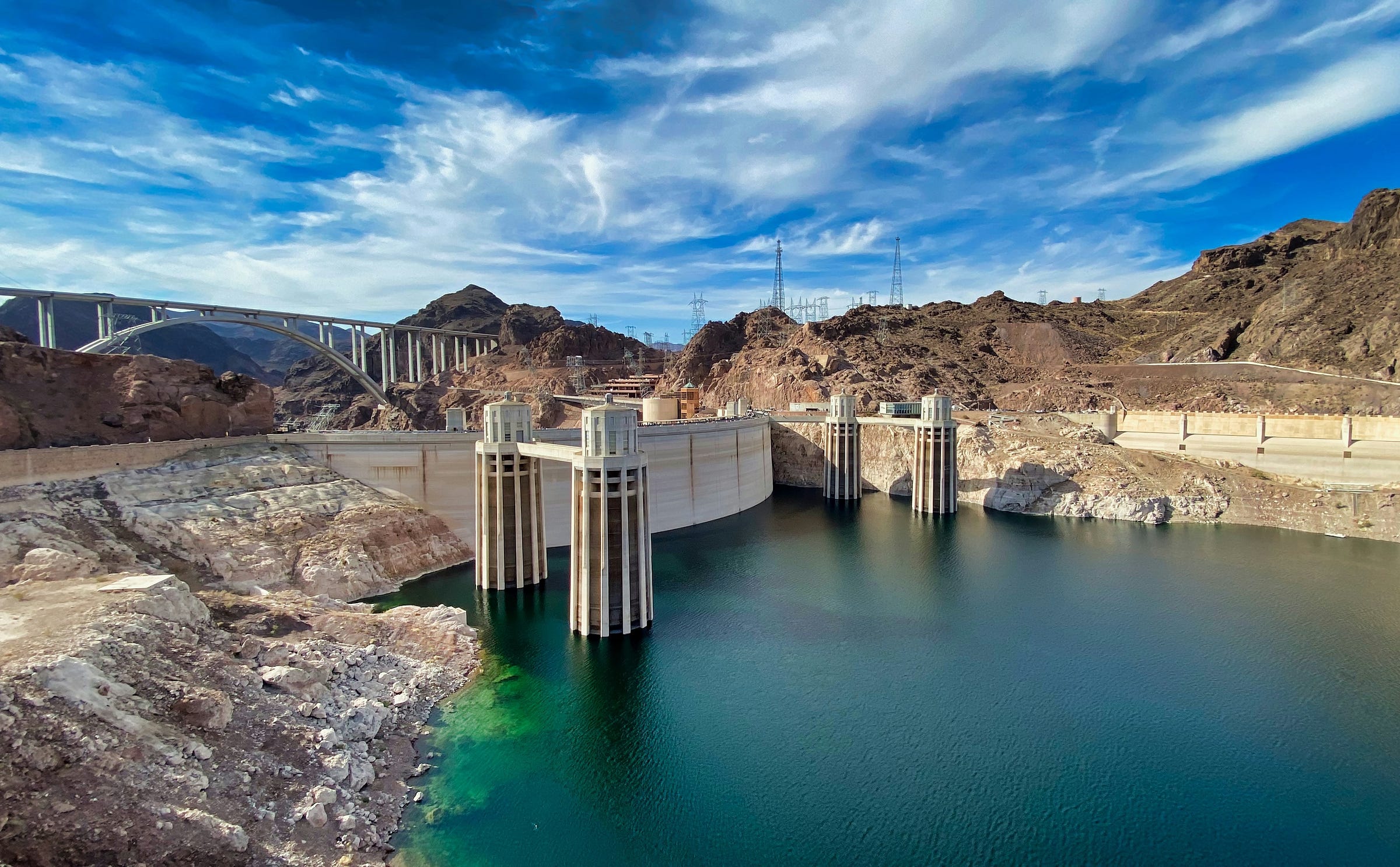 Back side of Hoover Dam shwing low water levels at the intakes.