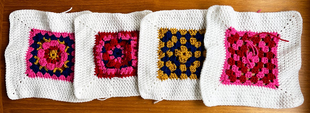 a photo of four big crochet squares a photo of four big crochet squares
