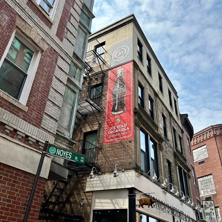 buildings, streets, signs, people