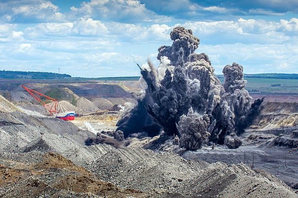Explosure on open pit Explosive works on a coal mine open pit quarry blast stock pictures, royalty-free photos & images