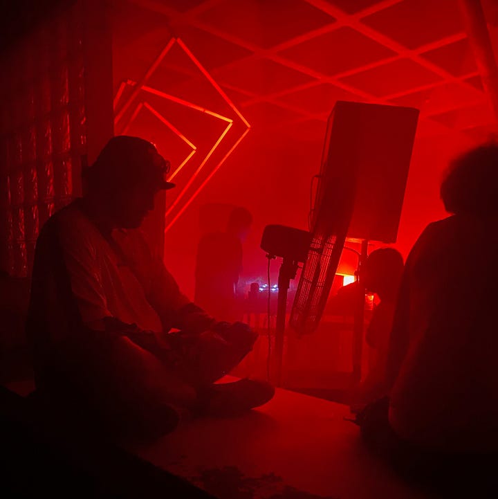 Two ravers soak in the ambiance at Pevert CDMX