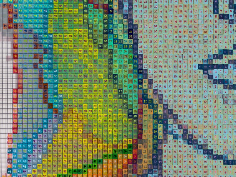 Close-up detail of a painting made up of a grid of different colour squares, each with a number, that forms part of a larger portrait from the series Numbers and Faces by the American artist Charles Gaines. Close-up detail of a painting made up of a grid of different colour squares, each with a number, that forms part of a larger portrait from the series Numbers and Faces by the American artist Charles Gaines.
