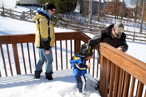 the wee family in the snow