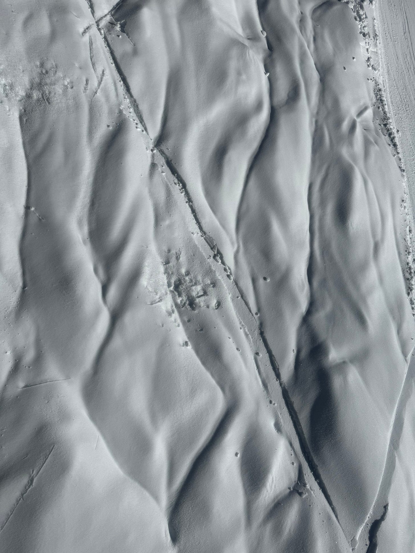 Snow covered by a thick layer of ice