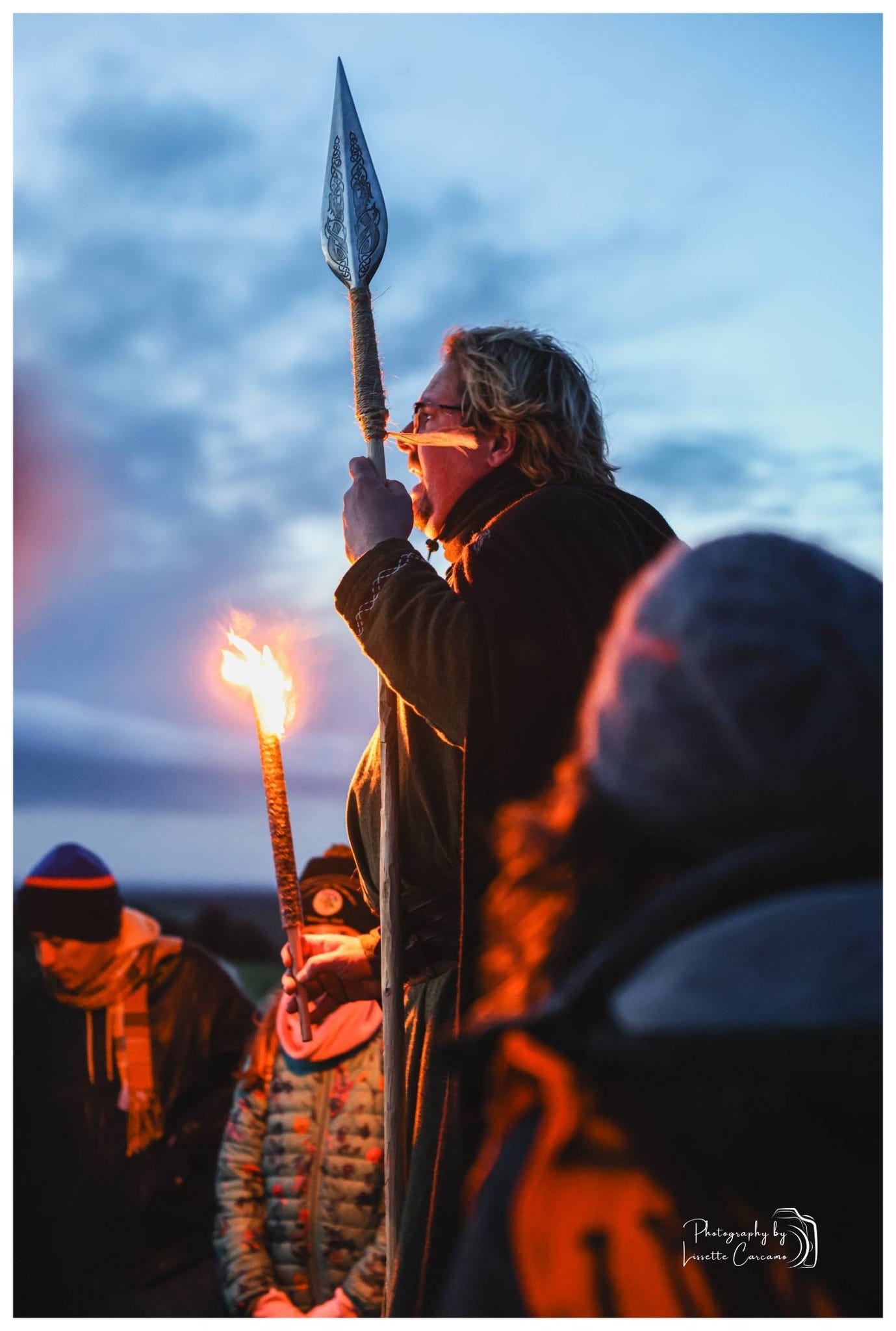 May be an image of fire and text