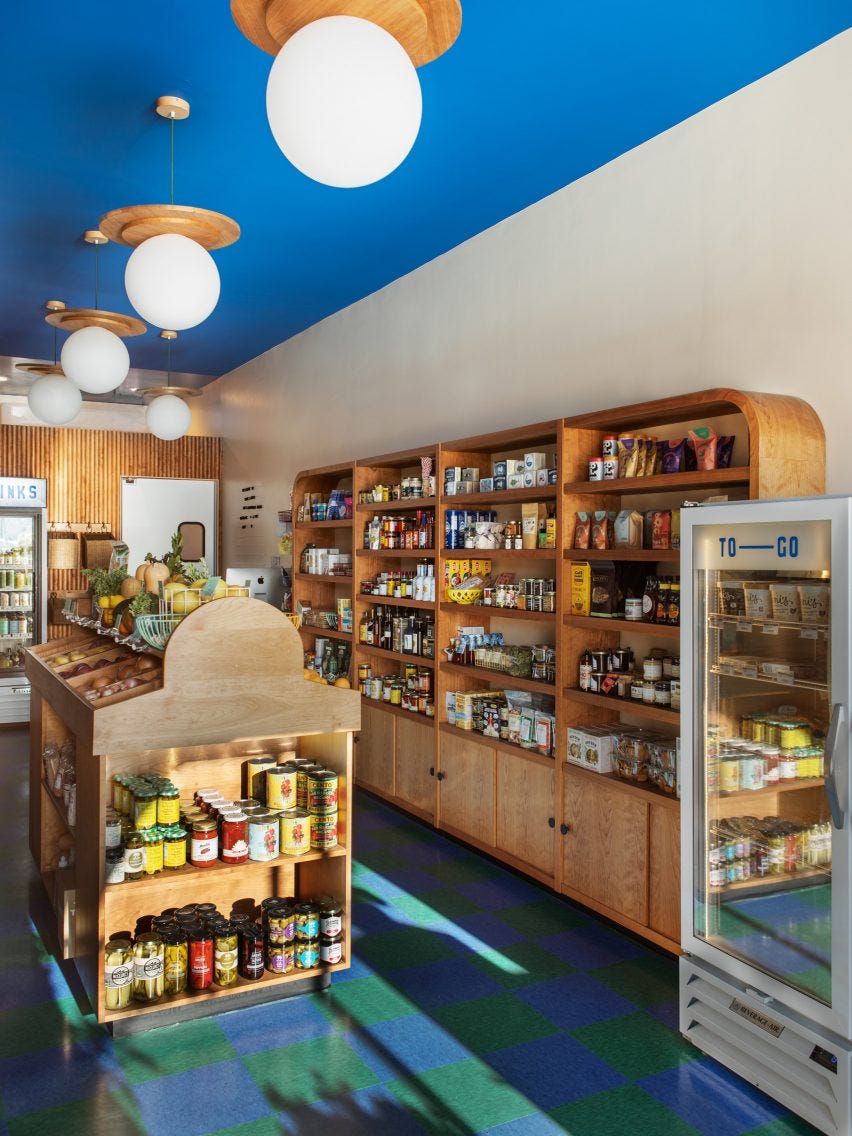 Vinyl checkerboard floor tiles and wooden shelving Vinyl checkerboard floor tiles and wooden shelving