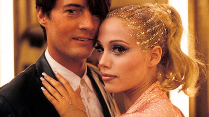 Kyle MacLachlan and Elizabeth Berkley in Showgirls