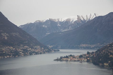 Top L-R: December 2009 snow-covered Lake Como, boarding for the seaplane tour, palm trees and persimmon in the snow, grey winter lake, a chilly seagully, view up the lake toward the Italian Alps