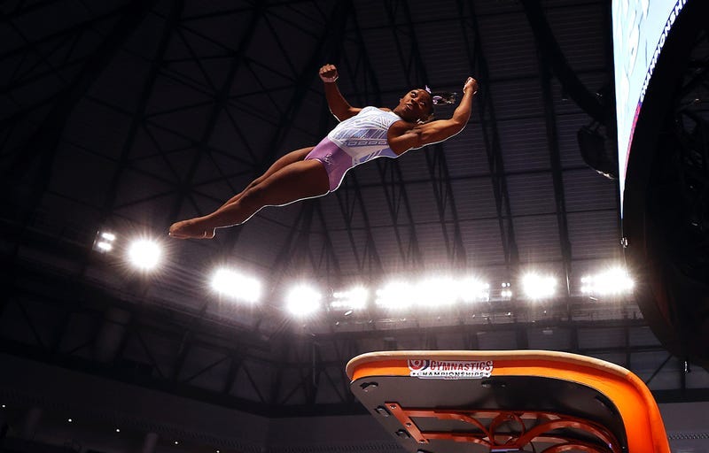 Simone Biles vaults.