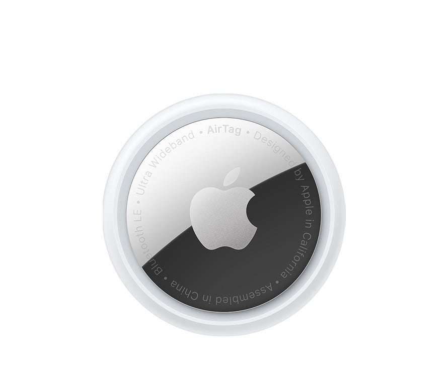 Top view of a single AirTag. Top view of a single AirTag.