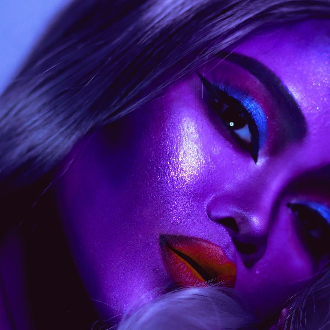 woman with purple eyes and purple eyes