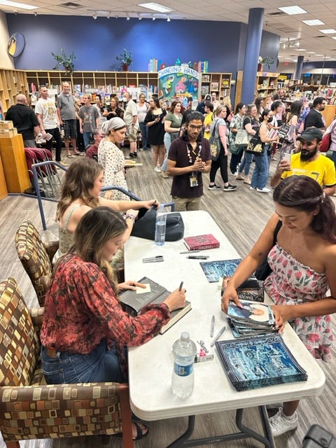 First photo: Alex signing with Adalyn at Changing Hands Tempe, Second photo: Alex chatting with J.Elle on stage at Changing Hands Phoenix