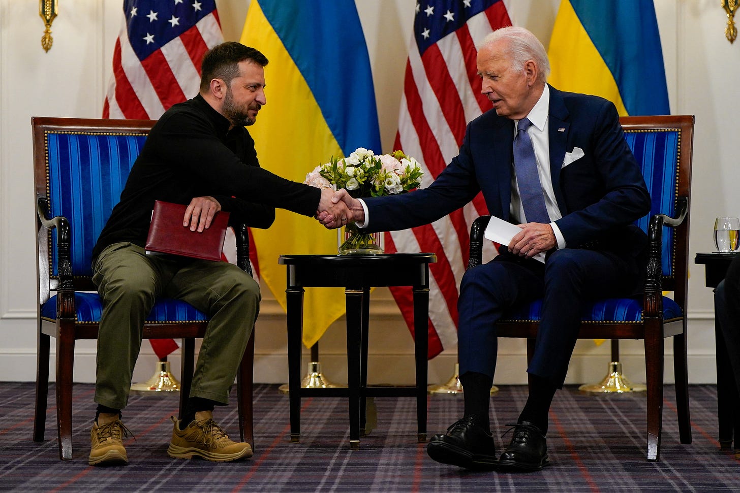 Biden, Zelenskiy inch toward NATO with 10-year defense agreement | Reuters