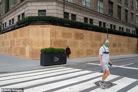 Image result from https://www.dailymail.co.uk/news/article-8908619/Protesters-Portland-smash-windows-try-set-Starbucks-fire-election-eve-demonstrations.html