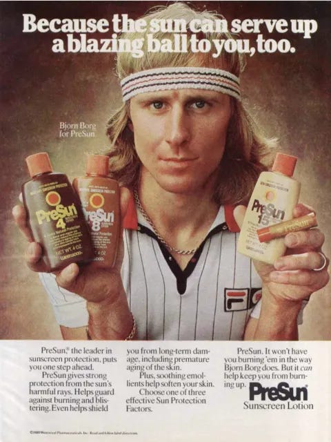 an athlete holds up three bottles of vintage sunscreen