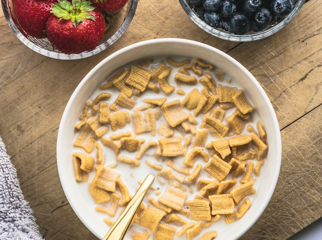 sliced cheese on white ceramic bowl