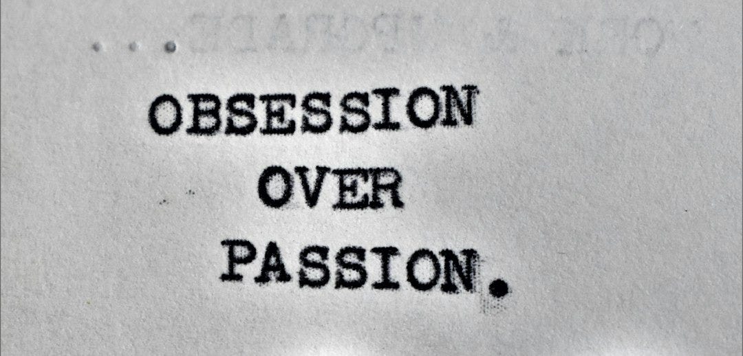 a typewriter with the words obsession over passion written on it