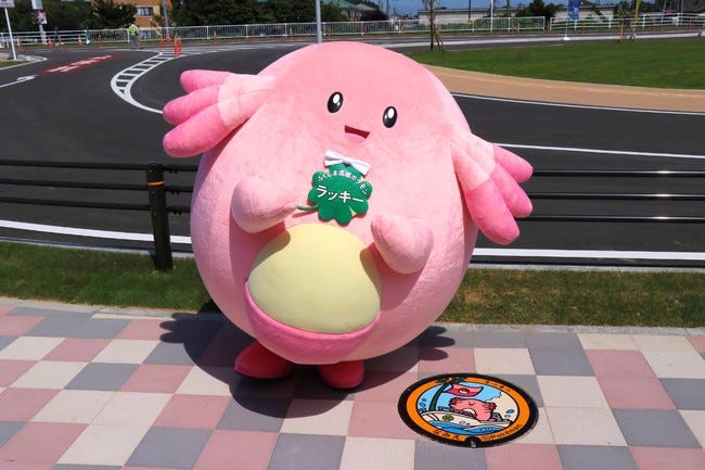 image of chansey mascot next to a chansey manhole cover in fukushima prefecture image of chansey mascot next to a chansey manhole cover in fukushima prefecture