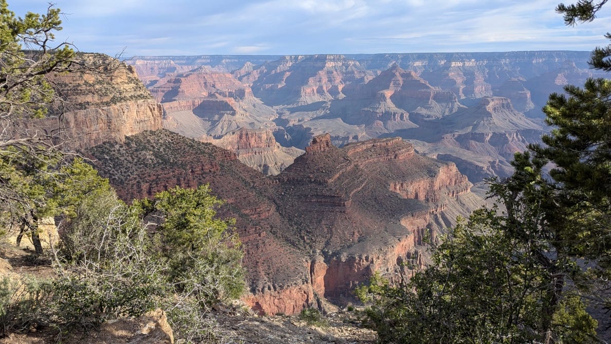 A landscape of a canyon

AI-generated content may be incorrect.