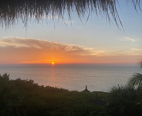photos of sunsets and beach scenes after dark in Holbox, Mexico. The nighttime beach scenes appear to have been taken during the daytime, but because of the phone camera's ability to regulate light, the photos look like they were taken during the day. 